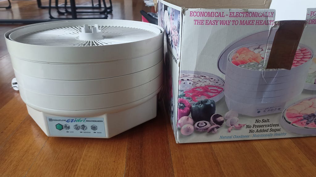 A food dehydrator and its box