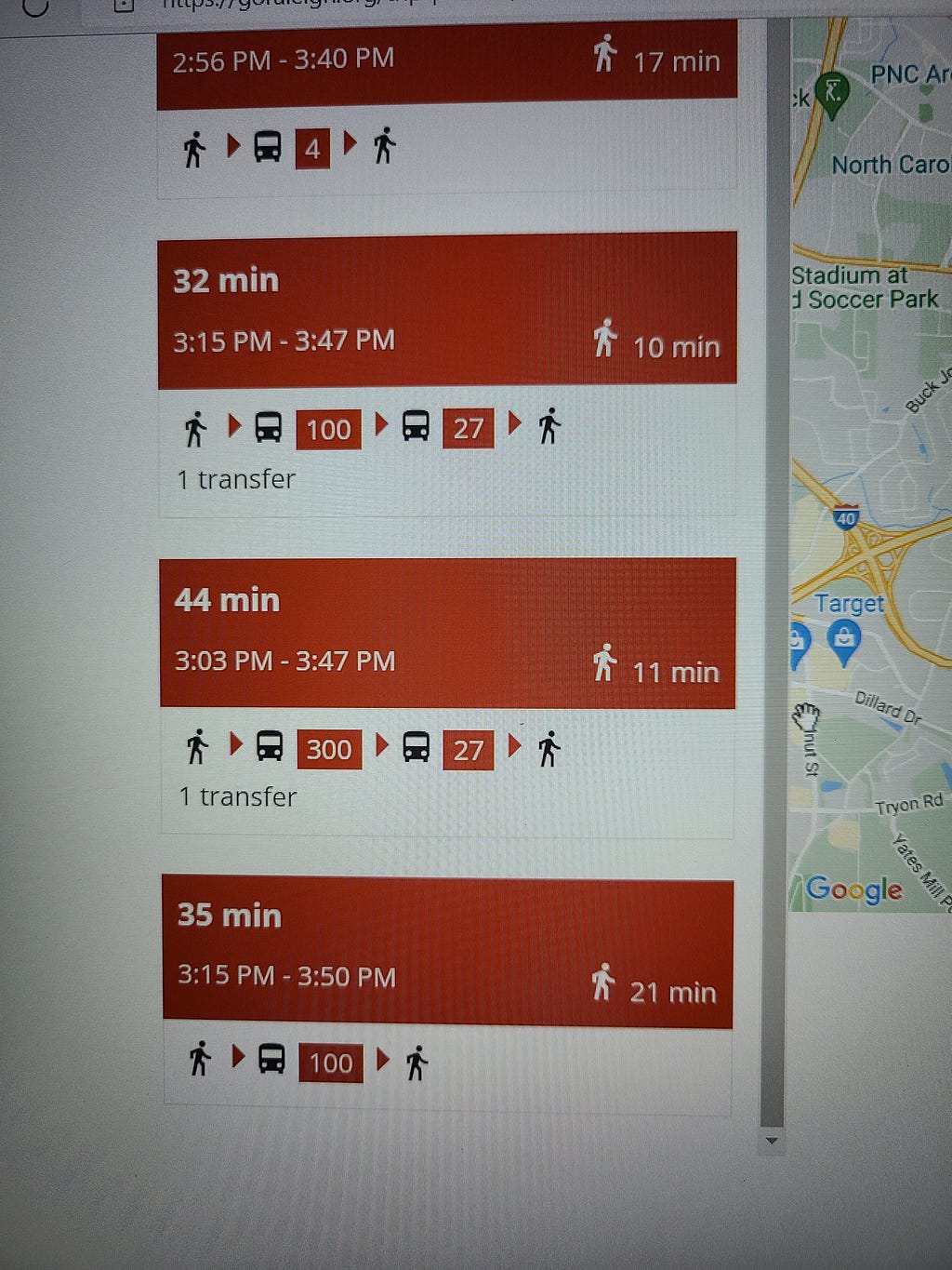 A laptop screen displaying different bus routes
