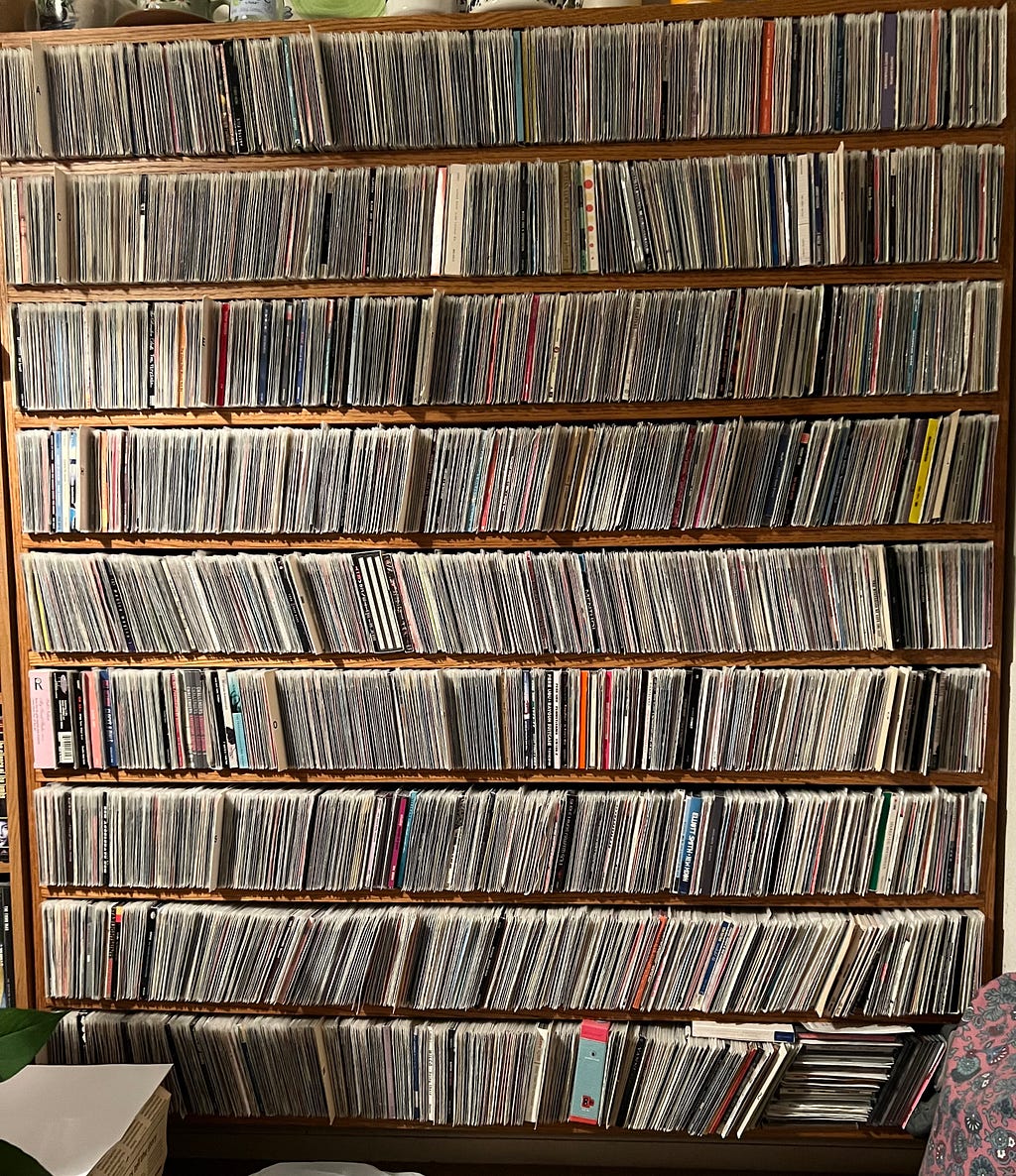 My CD Collection in single wall unit in sleeves instead of jewel cases/