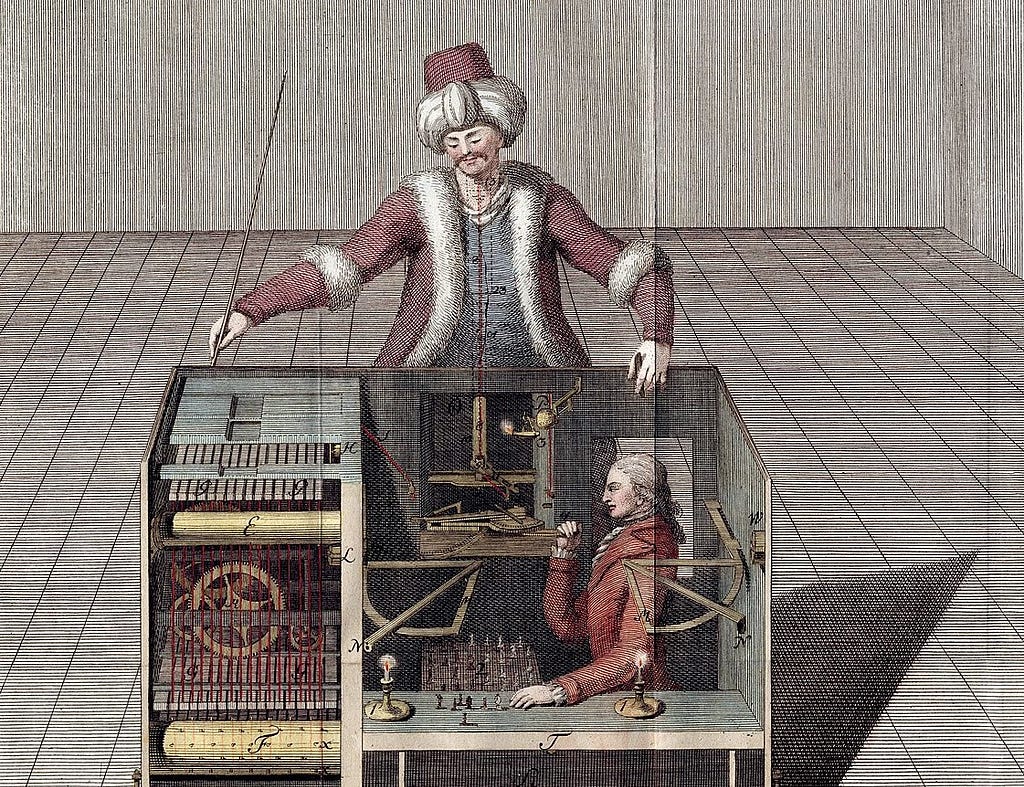 Picture of the mechanical turk, the first chess playing automaton, showing how it was operated with a human inside.