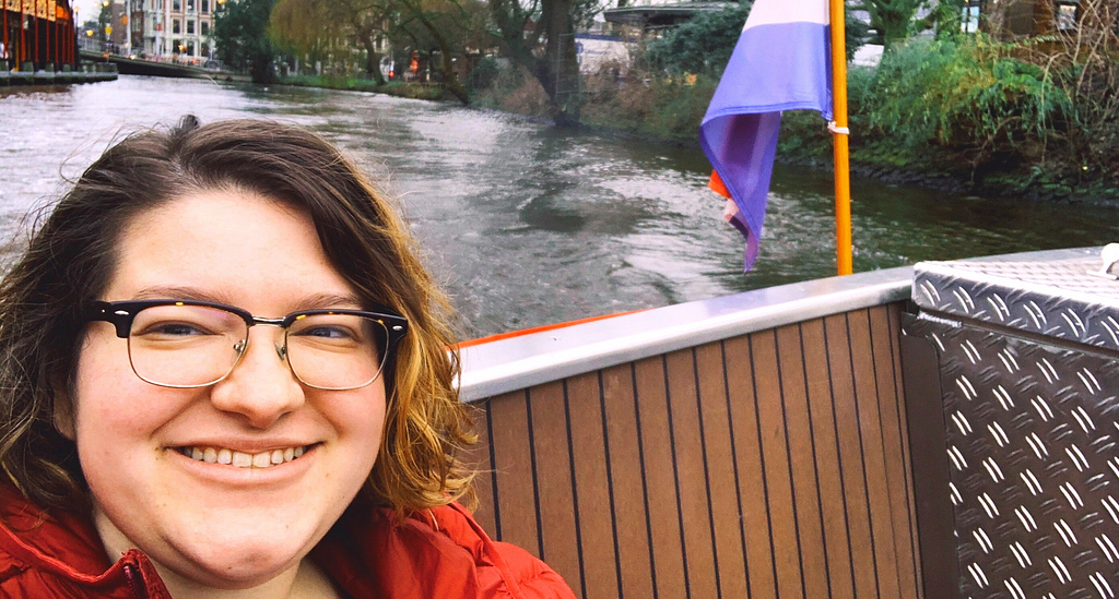 the author on a boat with the dutch flag