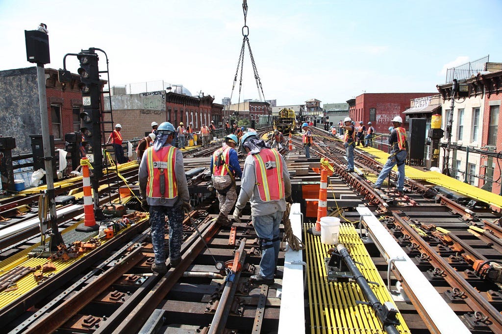 MTA workers in New York installing switches north of Myrtle Av on the J line.