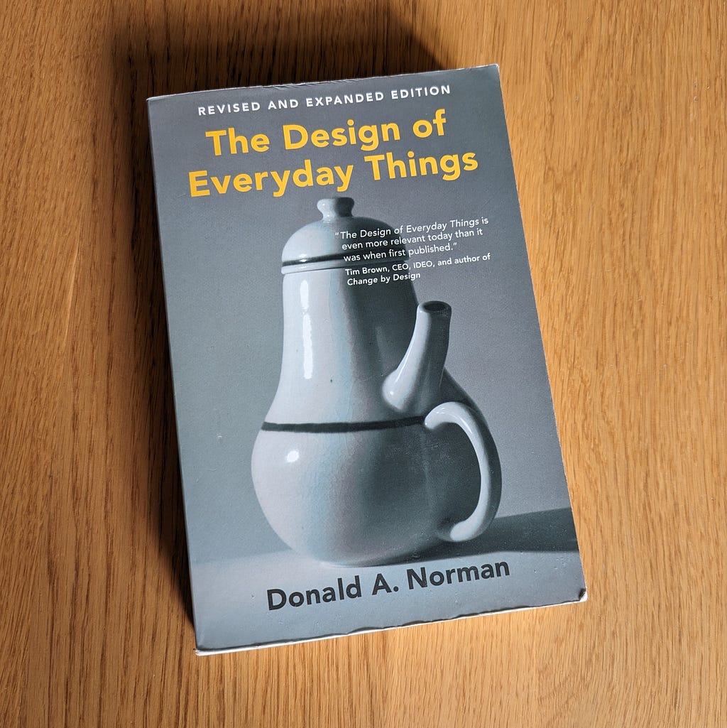 Don Norman’s The Design of Everyday Things book on a table.