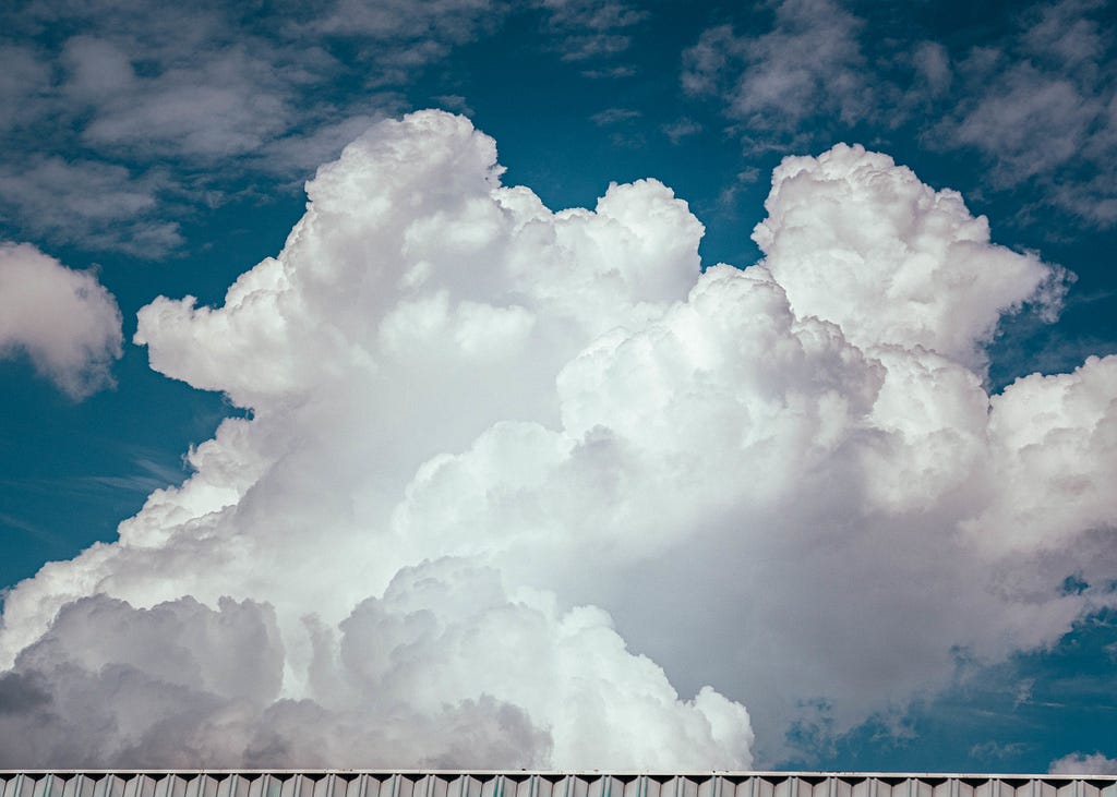 Large statocumulus clouds over the Little Rock River Market.