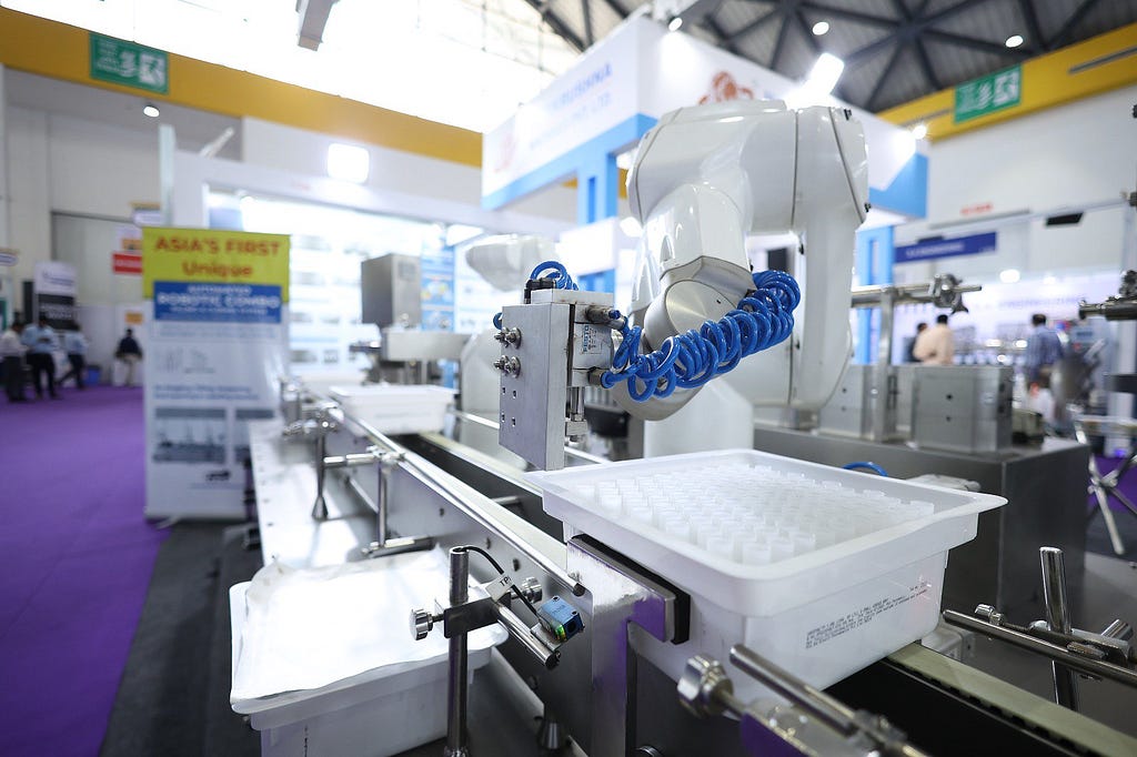 Robotic Pre-Filled Syringe Packaging Line by Harikrushna Machines Pvt. Ltd. (HMPL)
