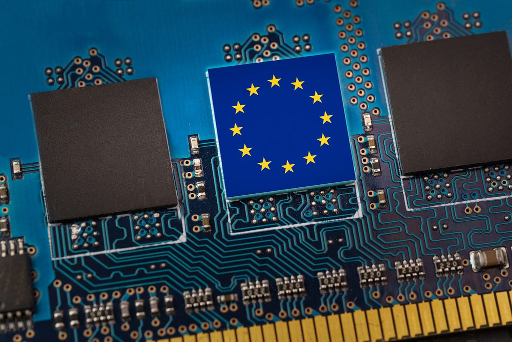 A circuit board with an EU flag over one of the panels, signifying connectivity with and within Europe