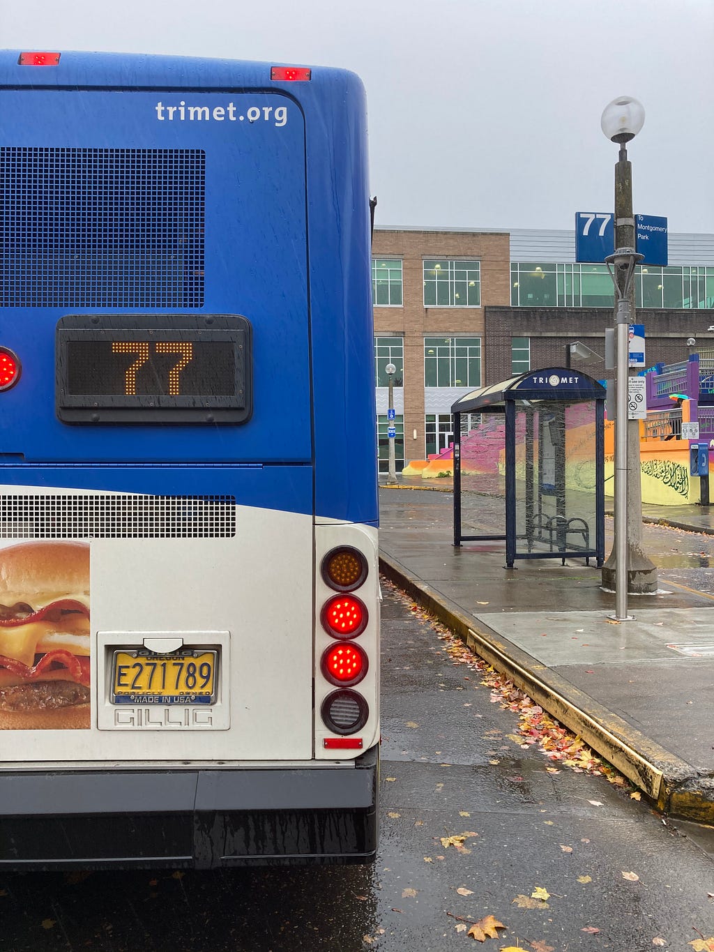 A TriMet Line 77 Bus waiting at Hollywood Transit Center in Portland.