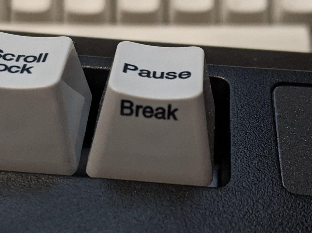 Pause/Break key on New Model M, which claims to perform Break, but doesn’t.