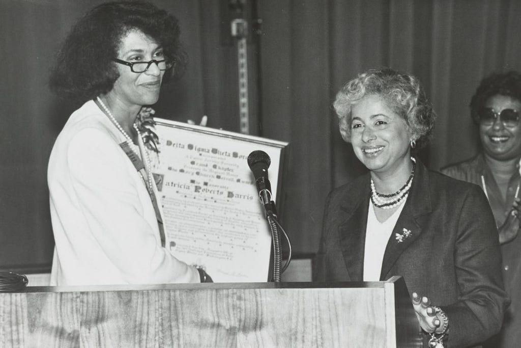 Patricia Roberts Harris accepts an an award from Delta Sigma Theta Sorority, Inc.