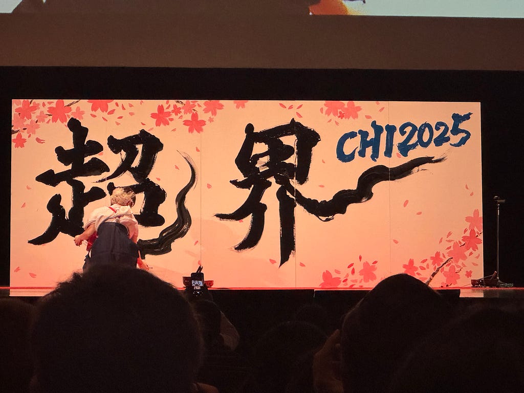A large canvas showing Japanese calligraphy with the acronym CHI 2025.