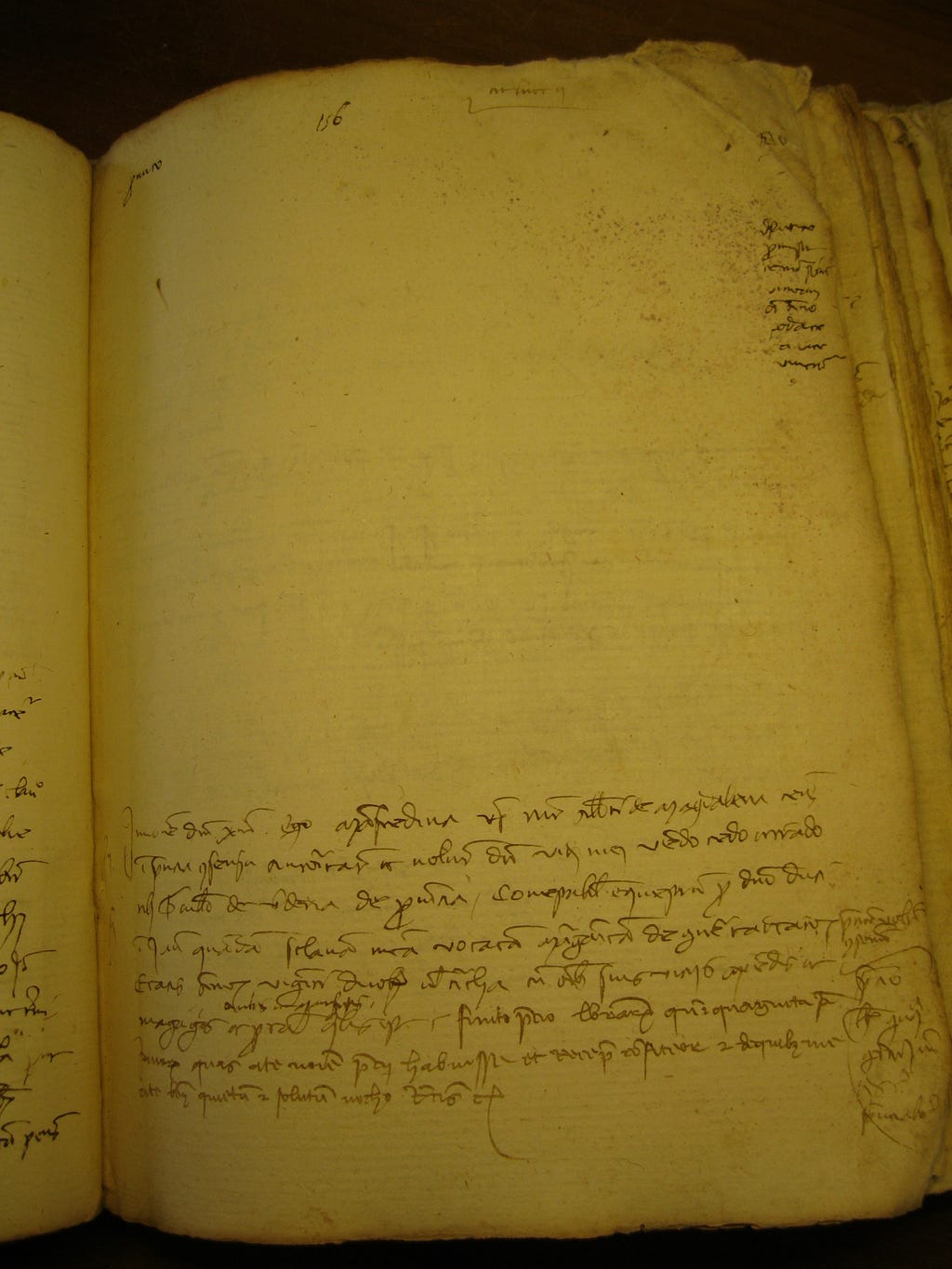 Page from a manuscript with handwriting on the lower third of the page.