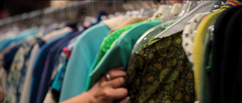 Clothing rack of colorful women’s clothing