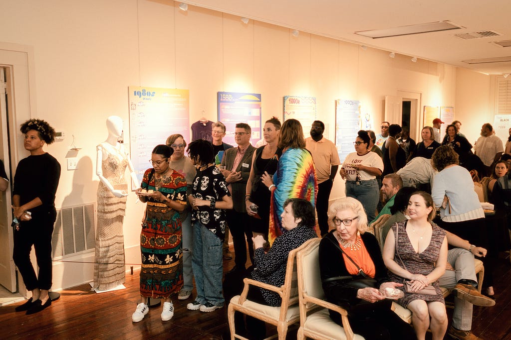 This picture shows a crowd gathered during the opening night of the Magnolia Memories Exhibit.