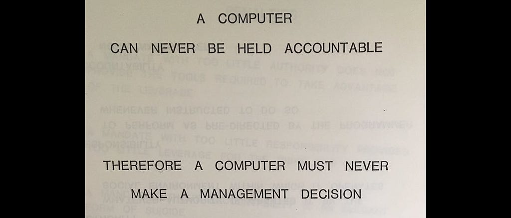 A slide from a presentation by IBM, reading “A COMPUTER CAN NEVER BE HELD ACCOUNTABLE, THEREFORE A COMPUTER MUST NEVER MAKE A MANAGEMENT DECISION