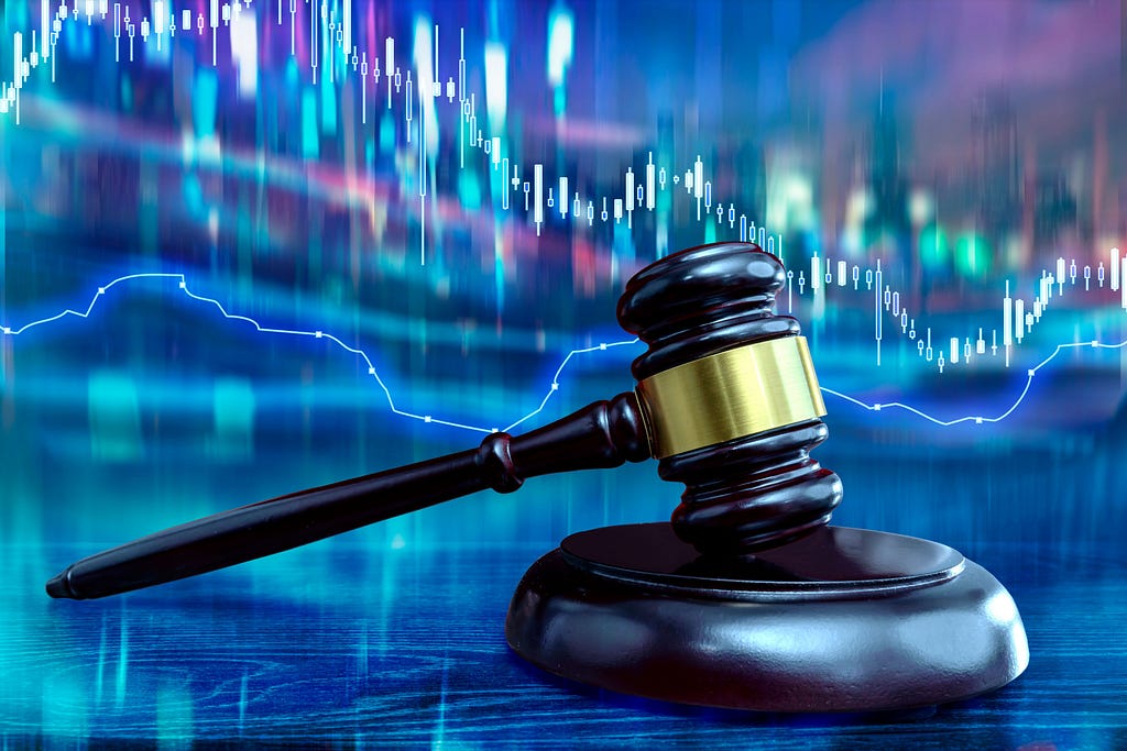 Judicial gavel and trading chart. Jurisprudence and Stock exchanges concept.