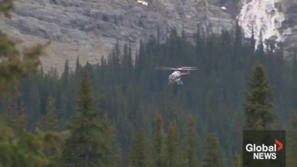 Medical helicopter crashes in Quebec lake leaving four missing.