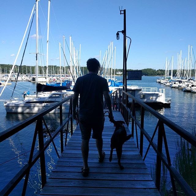 Michael and Kaylana walking down a dock