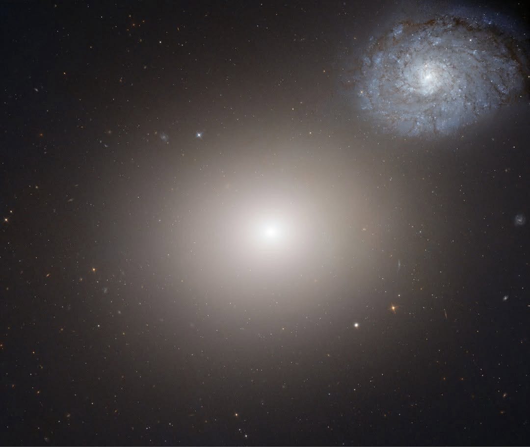 A galactic odd couple.