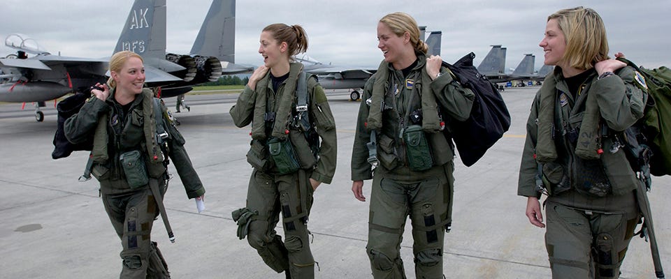 Four F-15 Eagle pilots from the 3rd Wing walk to their respective jets at Elmendorf Air Force Base, Alaska, on Wednesday, July 5, for the fini flight of Maj. Andrea Misener (far left). To her right are Capt. Jammie Jamieson, Maj. Carey Jones and Capt. Samantha Weeks. (U.S. Air Force photo/Tech. Sgt. Keith Brown)