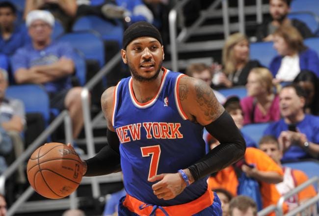 Hi-res-459189103-carmelo-anthony-of-the-new-york-knicks-dribbles-up-the_crop_north