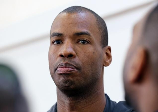 Brooklyn Nets center Jason Collins talks with reporters during practice on the campus of UCLA in Los Angeles Tuesday, Feb. 25, 2014.  Collins became the first openly gay active athlete in North America's four major professional sports Sunday, Feb. 23, signing a 10-day contract with the Brooklyn Nets. (AP Photo/Reed Saxon)