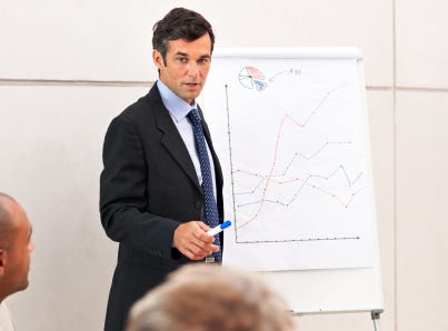 Confident boss in a seminar