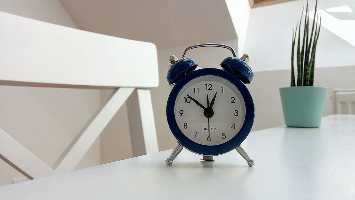 an alarm clock on a table