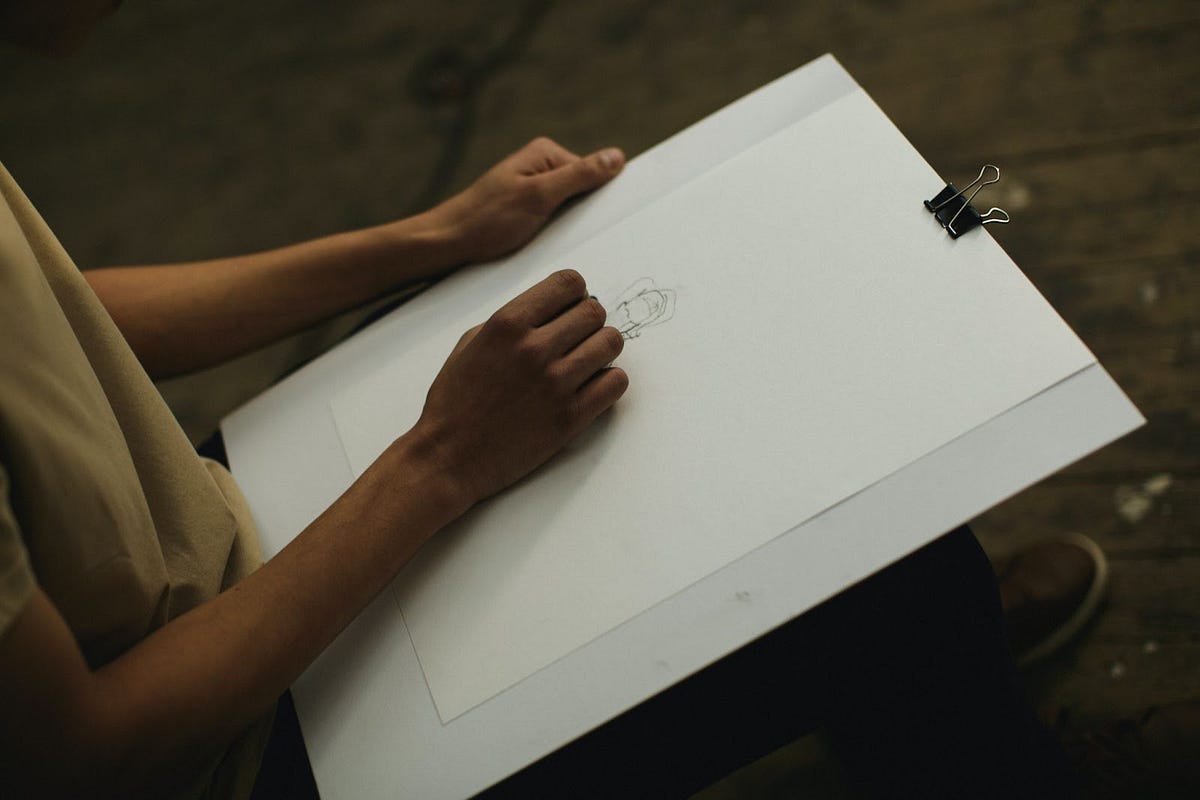 a person sketching