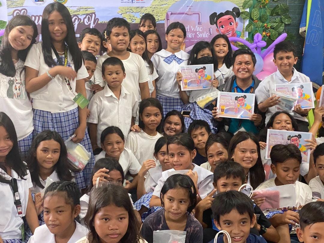 Cross sections of pupils from the Philippines after receiving the book, The Girl Who Found Her Smile. 