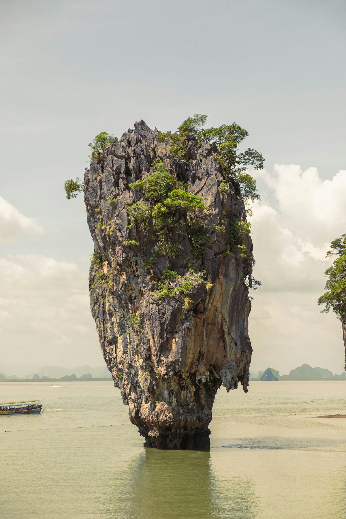 Floating island city landscape from Unsplash, showing terrain with water and architectural structures suspended in the sky, used as cover image for an article about an AI 3D generation benchmark.