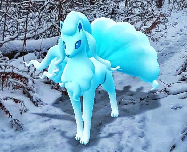 A gorgeous ice fox creature, with nine flowing tails, standing on the snow.