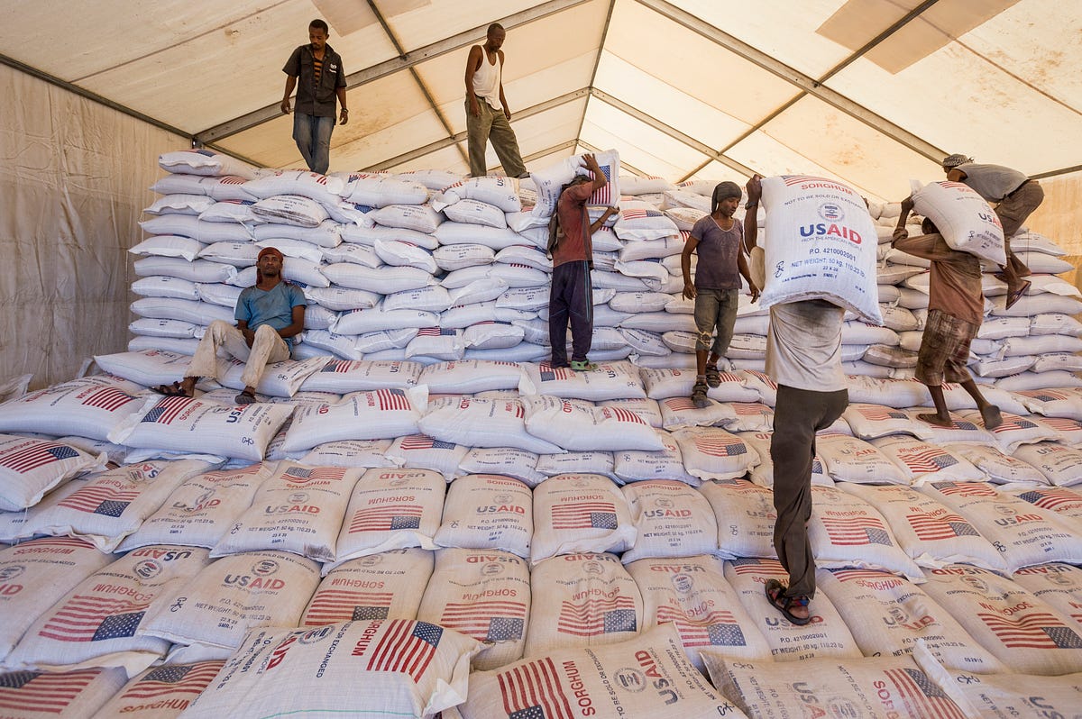 Ethiopia Food Donation Workers in Ethiopia offload a USAID food donation. The Agency is in the forefront of helping the United States respond to, counter and prevent complex threats and crises around the globe. / Petterik Wiggers, WFP