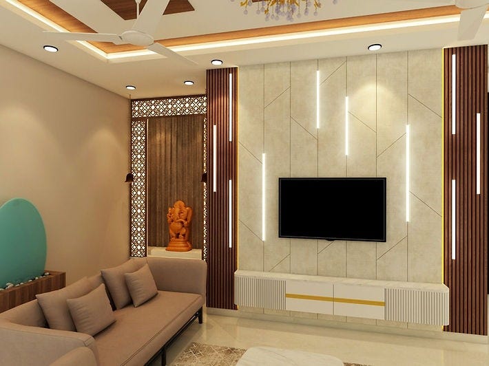 Modern living room interior by ArchitectsHive, featuring a sleek TV unit with vertical lighting, wooden paneling, neutral-toned sofa, and a stylish ceiling design. The pooja corner with a Ganesha idol and intricate jaali adds cultural depth. This thoughtfully designed space showcases the expertise of the best interior designers in Ghaziabad and exemplifies elegant interiors in Ghaziabad crafted by leading interior designers in Ghaziabad with balance and harmony.