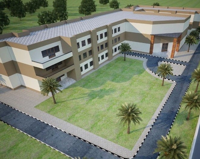 An aerial view of a modern institutional building designed with clean lines, earthy tones, and a spacious green courtyard — a project by ArchitectsHive, the best interior designers in Sonipat. The thoughtful exterior layout reflects the refined planning of an expert interior designer Sonipat. Blending architecture and design excellence, this structure highlights the innovation of a leading interior designer in Sonipat.