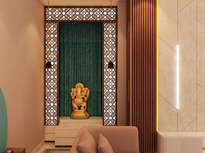 Elegant pooja room interior featuring a golden Ganesha idol, intricate wooden jaali panels with backlighting, and a teal textured backdrop, designed by ArchitectsHive. This serene spiritual corner reflects the craftsmanship of the best interior designers in Ghaziabad. A harmonious blend of tradition and modern design, it exemplifies thoughtful interiors in Ghaziabad created by leading interior designers in Ghaziabad for sacred and aesthetic home spaces.
