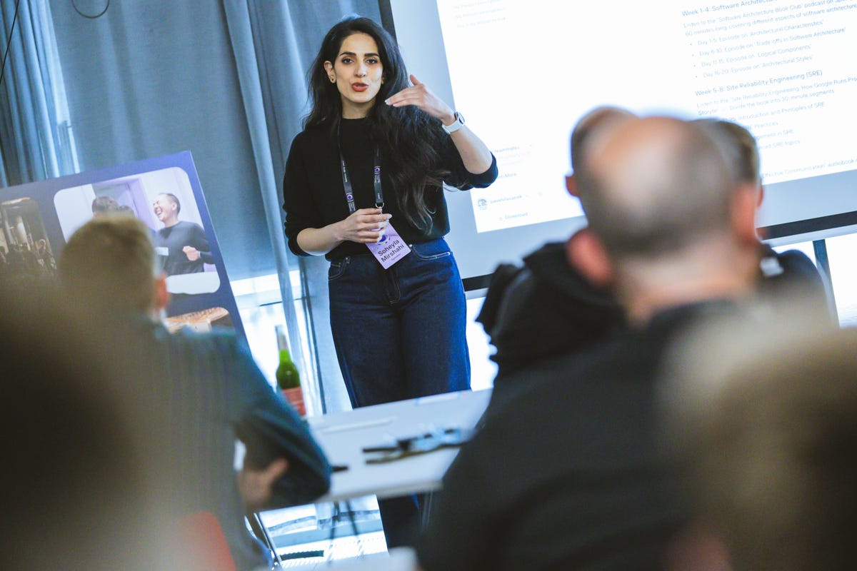Photo of ELC ambassador Soheyla Mirshahi facilitating a live workshop at ELC 2025 called 'Wait for a 5% raise or multiply your value?'