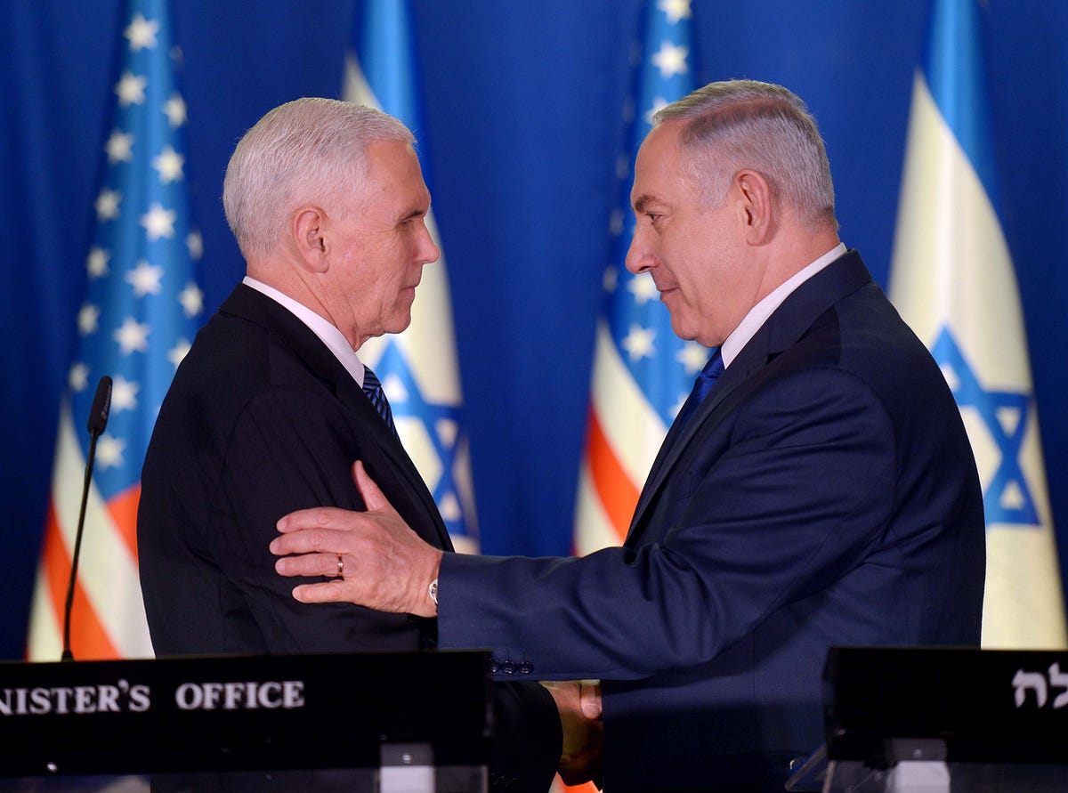 U.S. Vice President Mike Pence and Israeli Prime Minister Benjamin Netanyahu shake hands