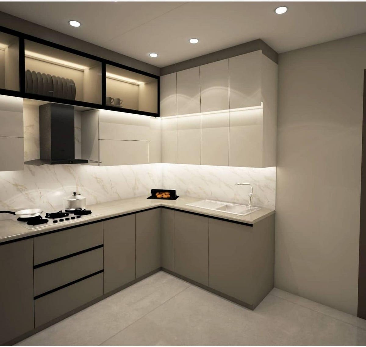 This L-shaped modular kitchen blends functionality with style through clean lines, muted tones, and smart storage solutions. Overhead cabinets with under-cabinet lighting create a bright workspace, while the marble backsplash adds a touch of sophistication. The built-in hob and chimney enhance efficiency, and the seamless cabinetry ensures a clutter-free look. Designed for modern living, this kitchen offers elegance, durability, and everyday convenience.
