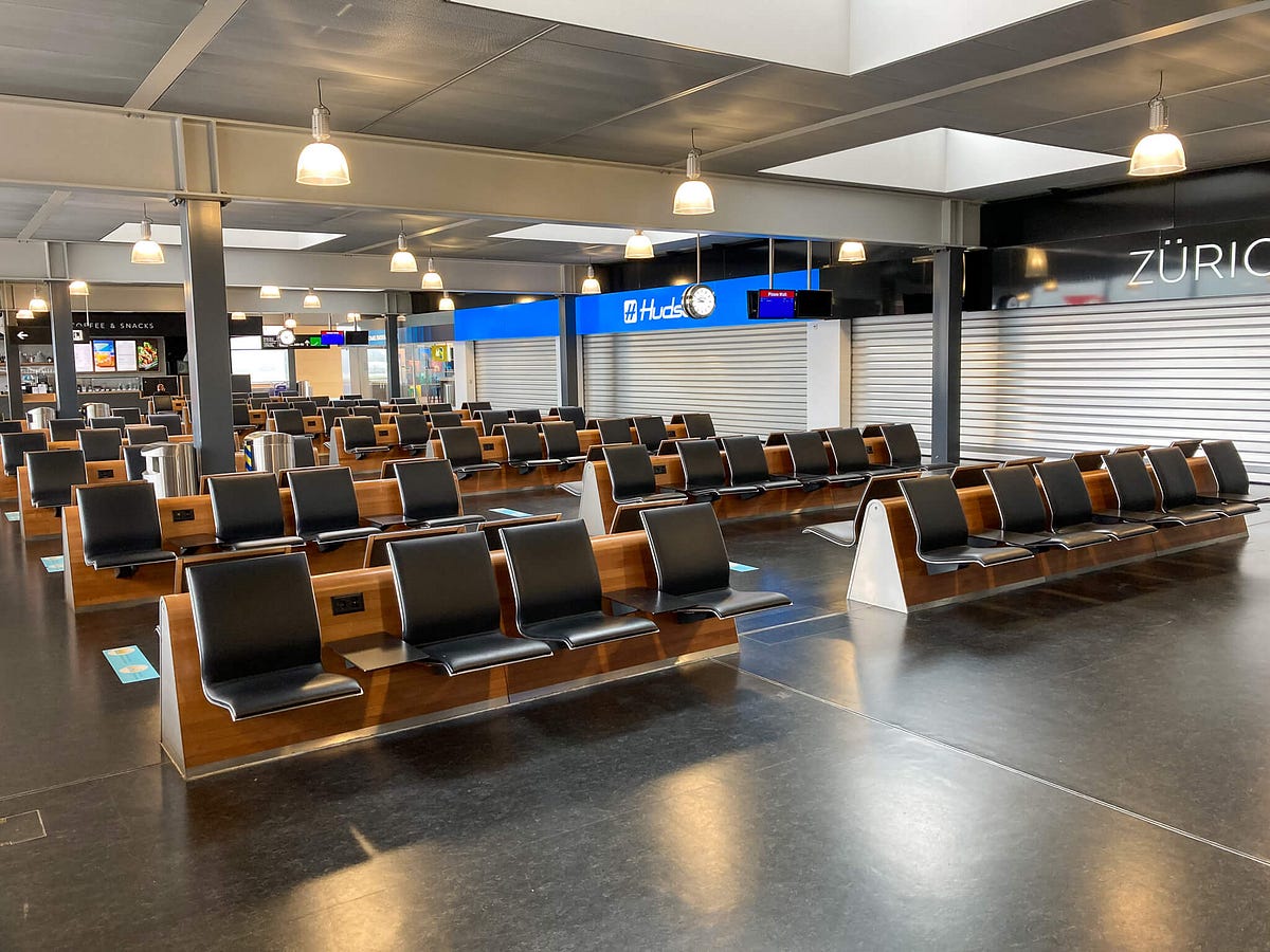 Airline terminal with rows of empty seats