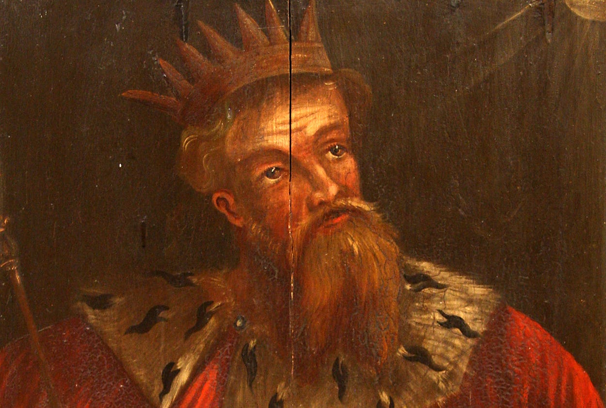 Painting of a king gazing upward, oil on wood paneling.