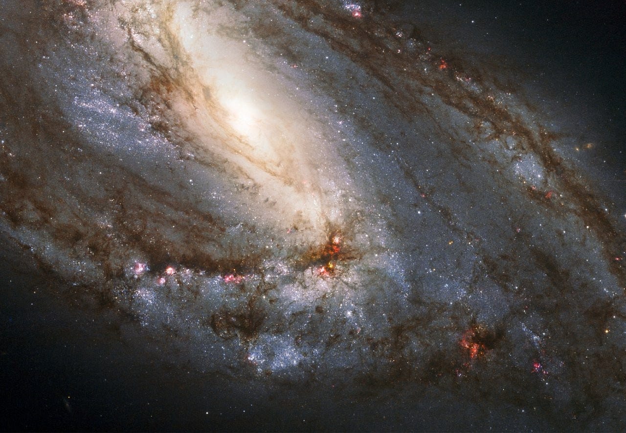 A galaxy pulled out of shape. A galaxy pulled out of shape.