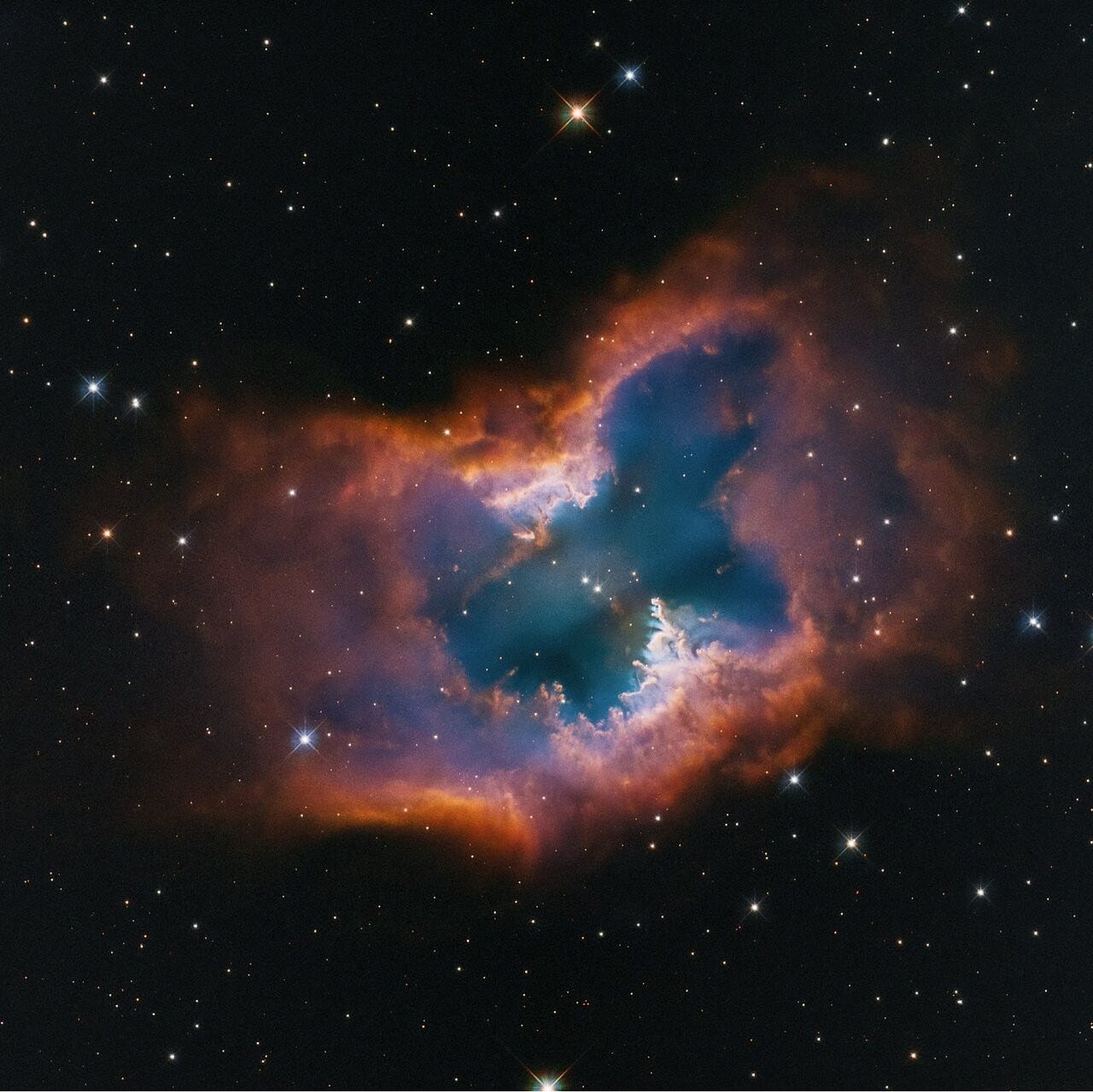A cosmic hourglass sculpted by a dying star.