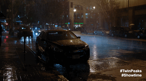 Albert's car in rain and night lighting on street animated GIF
