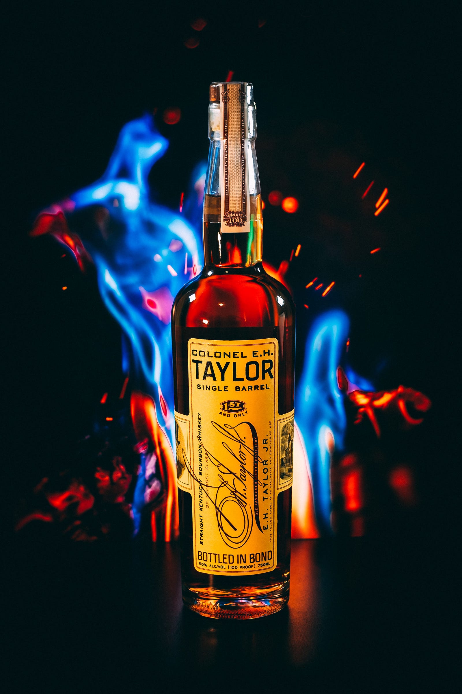 A bottle of alcholoh, labeled “Taylor” sits in the foreground, as flames rise behind it. Excessive alcohol intake can lead to elevated HDL cholesterol levels, possibly associated with an increased risk of dementia. I know that moderation is key.