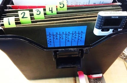 File folders labeled with numbers. 