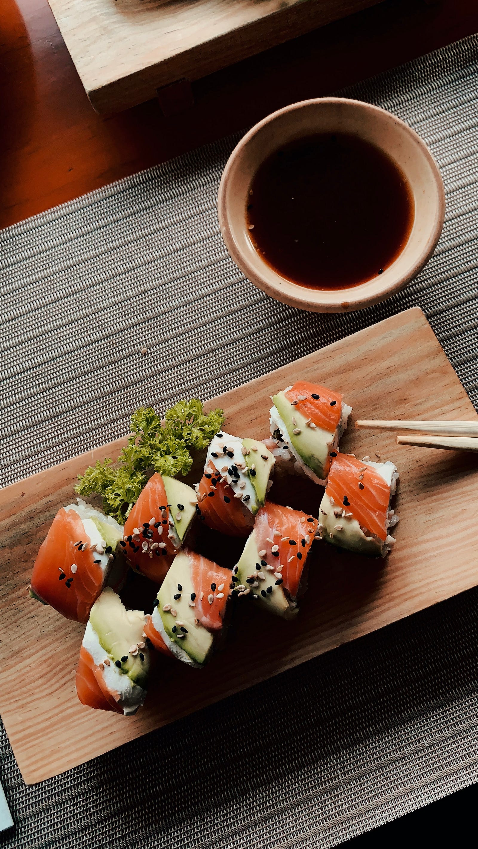 A flat wooden plate with eight pieces of sushi. So many view self-improvement as a destination. Reach your goal, and voila! You are done. But what if you could aim to get one percent better daily? Small, incremental improvements — kaizen — over months, years, and decades can lead to extraordinary outcomes.