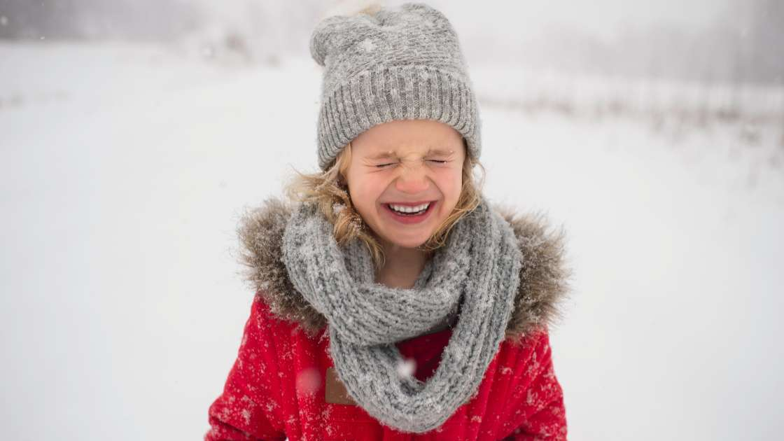 Smiling girl in the snow