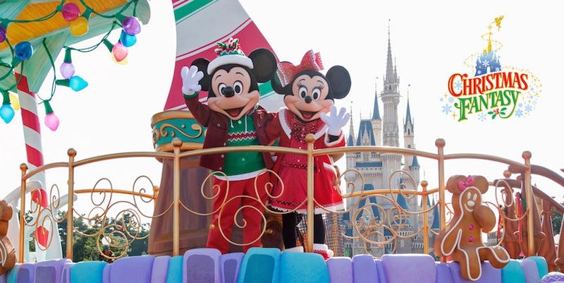 Mickey Mouse and Minnie Mouse are dressed up for Christmas in Japan