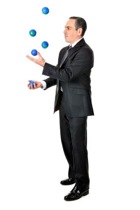 Businessman juggling