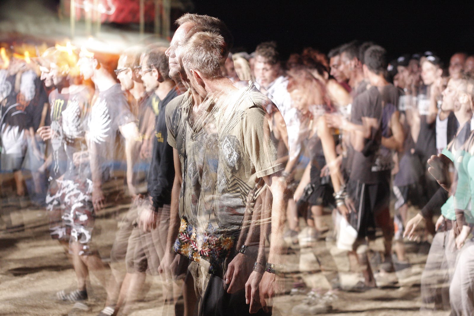 Dozens  young people walks to the left, blurred as though visualized while on a psychedelic drug like LSD or psilocybin. Hallucinogens can produce various effects, including visual distortions, time perception alterations, thought pattern changes, and intensified emotions.